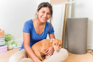 Latin Bolivian young female student independence moving home apartment for university with pet